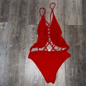 Red trendy cut out one piece swimsuit